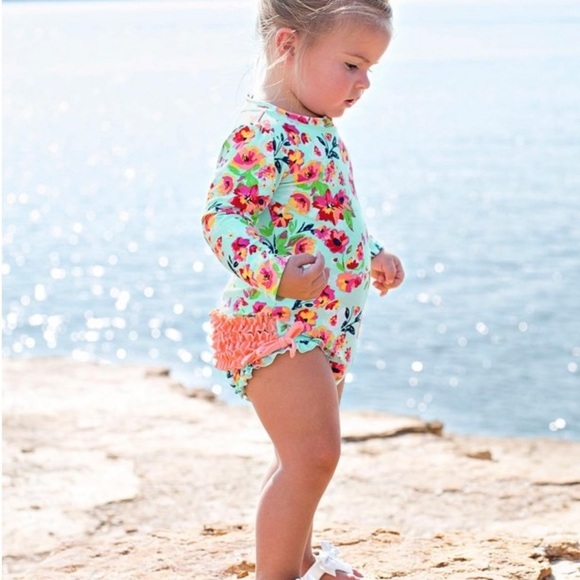RuffleButts Painted Flowers One Piece Rash Guard Swimsuit